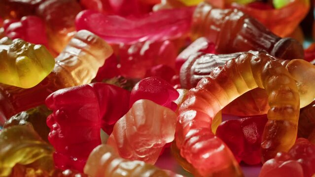 Jelly marmalade cola bottle bear close up, Confiture Bean candy jujube Marmalade bears with cod cannabis close up. 