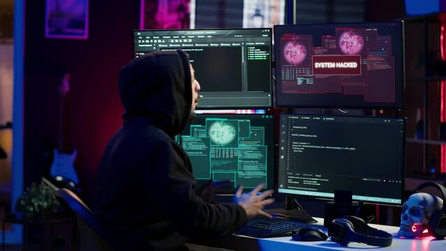 Hacker getting angry after failing to successfully develop spyware software stealing data. Frustrated scammer upset after written malicious code proves to be unsuccessful, camera A