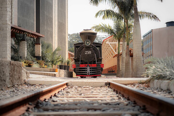 An old locomotive stopped at the front station