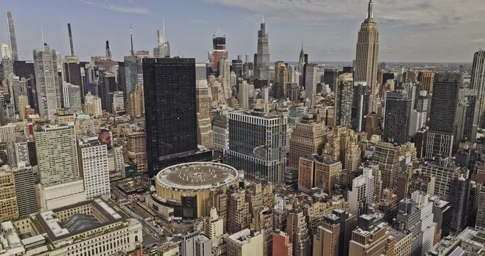 NYC New York Aerial v445 drone flyover Chelsea capturing Midtown Manhattan cityscape, panning down birds eye view of famous Madison Square Garden Arena - Shot with Mavic 3 Pro Cine - September 2023