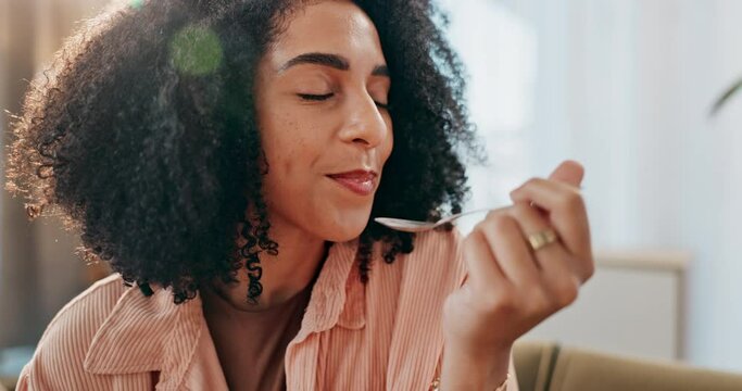 Black woman, ice cream and eating on sofa with smile for satisfaction, snack and craving in house. African girl, gelato and happy in home living room on couch for frozen dessert or yogurt and sweets