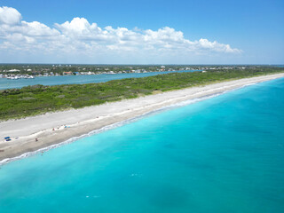 Aerial view of the intracoastal waterway and beach near Blowing Rocks Nature Preserve sanctuary on the barrier island of Jupiter Island in Palm Beach County, Florida