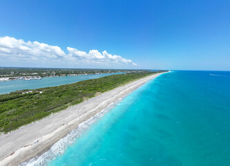 Gorgeous beach day near Blowing Rocks Nature Preserve sanctuary on the barrier island of Jupiter Island in southeast Florida