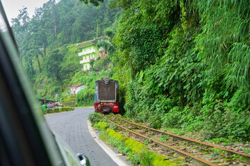 Darjeeling,West Bengal,India - 10th August 2023 : Diesel Toy train, running over narrow gauge...