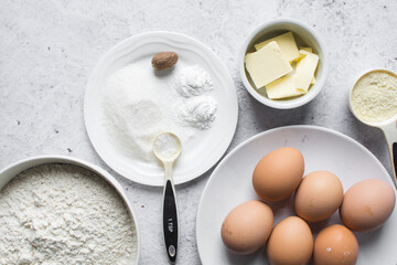 Overhead view of mise en place of ingredients for making Nigerian egg roll, flatlay of ingredients for making african egg roll, process of making egg rolls