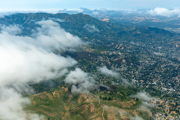 Aerial view of the towns of Sausalito and Mill Valley with passing clouds