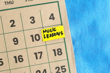 Music lessons reminder on calendar. Weekend wellness and creativity activity.