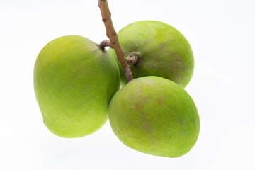 Bunch of mangoes on white background, close-up