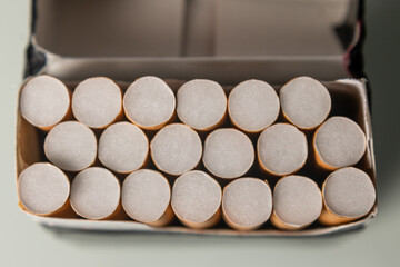 Closeup shot of white pack of cigarettes.