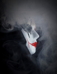 Black silk cloak and hand painted mask with smoke effects with unique patterns and designs