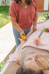 Woman in the healing therapy with roses