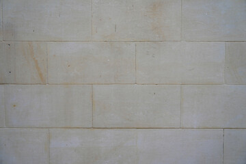 Yellow limestone brick wall detail