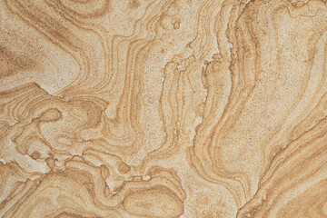 Swirled sandstone surface close-up
