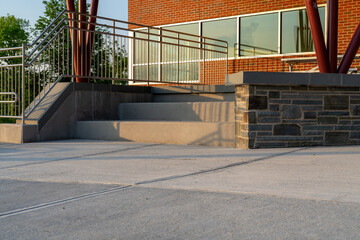 Example of a stainless steel railing along an exterior set of stairs at a public, commercial building.