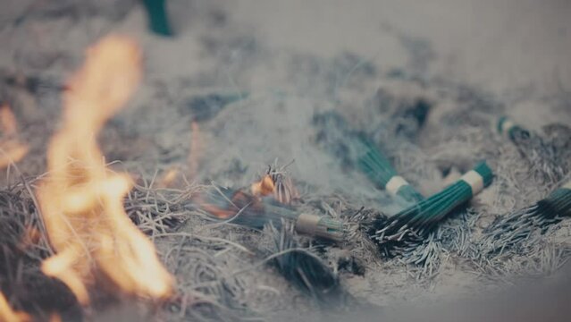 Burning Incense Sticks At Shinto Shrine In Tokyo, Japan. - closeup shot 