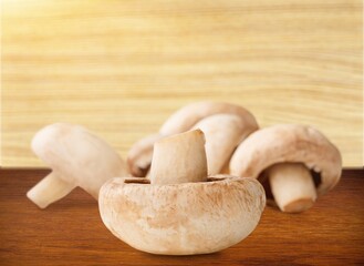 Tasty fresh ripe mushrooms on the desk