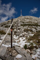 Climbing Biokovo mountain with the help of a rope fence