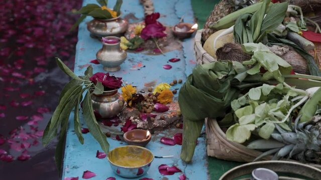 holy religious offerings with oil lamp and fruits for hindu sun god at chhath festival
