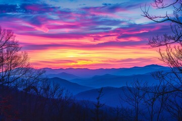 Vibrant Sunset Over Layered Mountain Ridges