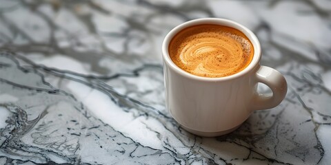 Espresso Doppio in Tiny Ceramic Cup on Marble Countertop with Upscale Coffee Shop Ambiance