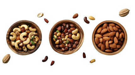 Three wooden bowls with different types of nuts isolated on the transparent background, shown from above in a top view flat lay.
