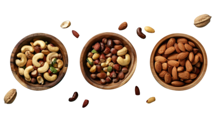 Three wooden bowls with different types of nuts isolated on the transparent background, shown from above in a top view flat lay.