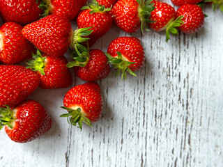 strawberries on wooden background
