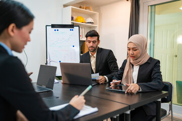 Multiracial business people having meeting and brainstorming discussed about work in conference room in the creative office.