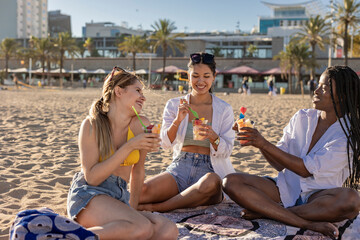 Friends Enjoying Refreshing Drinks at the Beach