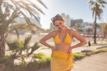 Woman in Yellow Bikini Enjoying the Beach