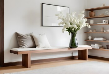 A minimalist living room with white sofa, a wooden coffe table, and a large framed blank wall art. 3D Rendering