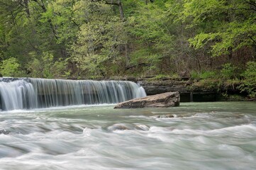 Smooth waterfall at Haw Creek in lush green setting