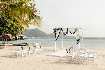 St Lucia beach wedding setup with ocean and palms