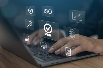 Business hand with the sign of the top service Quality assurance, Guarantee, Standards, ISO...