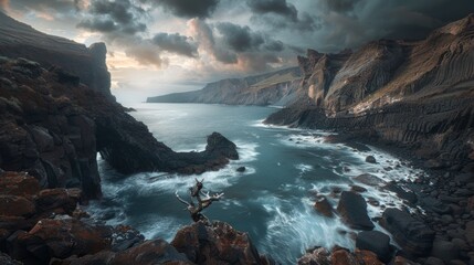 Dramatic coastal landscape with rugged cliffs and misty ocean waves at sunset, capturing the...