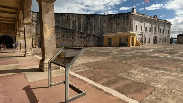walking in the courtyard of castille san cristobal in san juan puerto rico (historic site on caribbean island) travel tourism destination national park sightseeing spanish ruins old city center tour