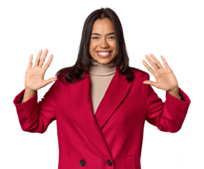 Young filipino woman showing number ten with hands.