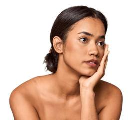 Young Filipino touching skin, radiance and care