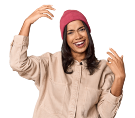Joyful Filipino woman dancing in studio