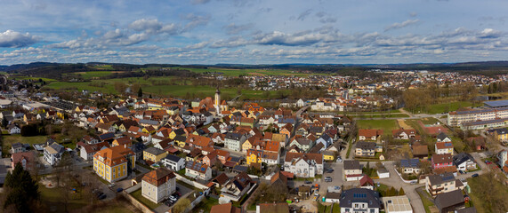 Aerial drone view of the town Nittenau in Bavaria, Upper Palatinate, Oberpfalz on the river Regen on sunny day with clouds