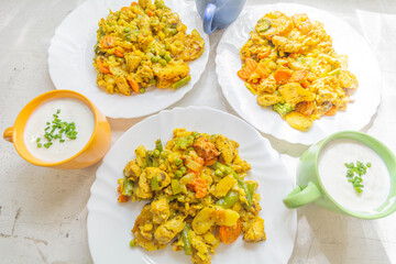 Chicken stewed with vegetables and kefir with chives.