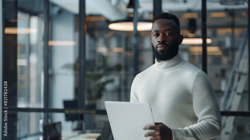 Poster project manager wearing a white jumper and working on app user interface in an agency. handsome blac