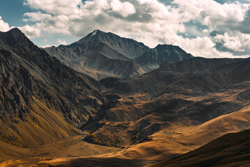 Incredibly beautiful mountain landscape. Mountain peaks in the sun. Panoramic view of the autumn...