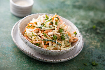 Healthy vegetable salad with yogurt dressing