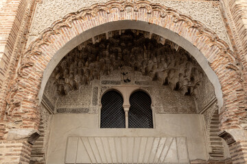 Arab entrance facade to the Corral del Carbón in Granada, Spain.