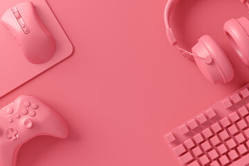 Modern home office setup featuring keyboard, gaming controllers and headphones