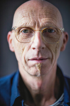 Senior man with wrinkled skin