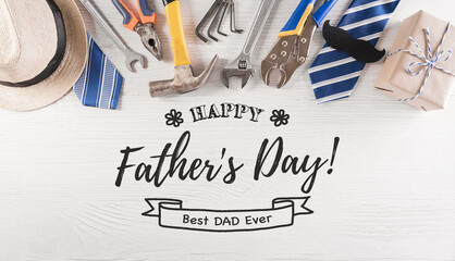 Happy Father's Day decoration with beautiful tie with mustache, hand tools, glasses, gift box and...