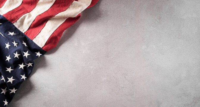 Happy Independence day: 4th of July, American flag on white wooden background.