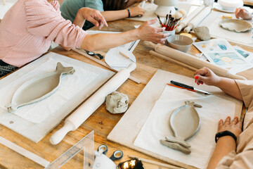 Ceramic workshop. Working in groups on ceramic creations